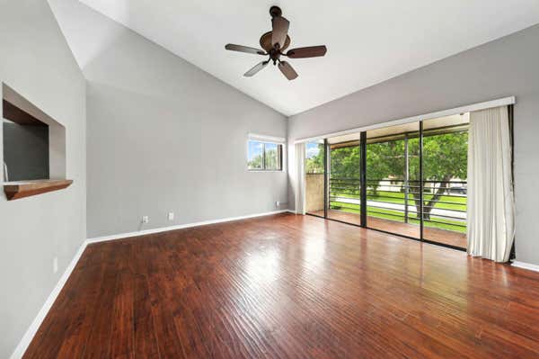 20 VIA DE CASAS SUR APT 201, BOYNTON BEACH, FL 33426 - Image 1