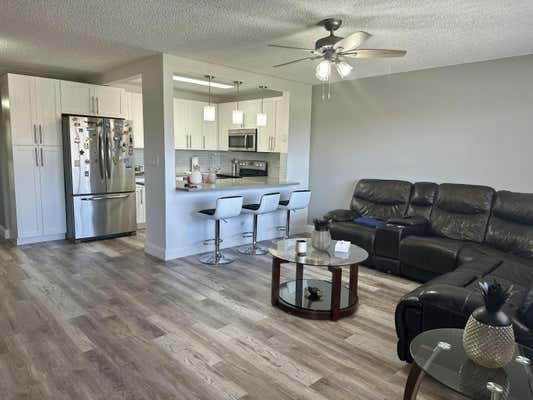 700 VILLAGE GREEN CT APT H319, PALM SPRINGS, FL 33461 - Image 1