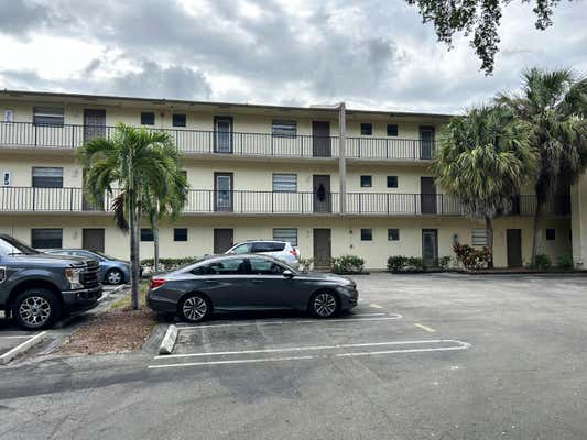 9150 NW 38TH DR APT 111, CORAL SPRINGS, FL 33065 - Image 1