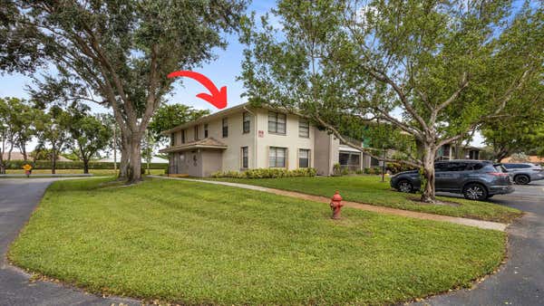 9780 PINEAPPLE TREE DR APT 201, BOYNTON BEACH, FL 33436 - Image 1