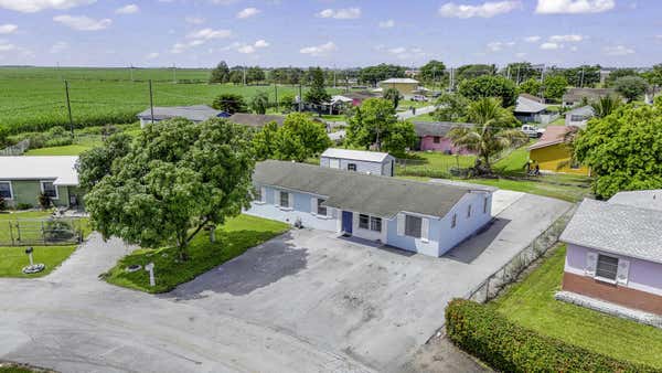 1233 VAUGHN CIR, BELLE GLADE, FL 33430 - Image 1