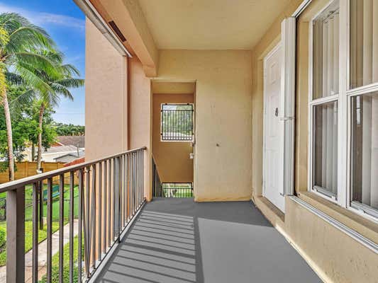 3557 FOREST HILL BLVD APT 50, PALM SPRINGS, FL 33406, photo 2 of 24