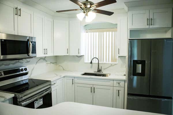 721 LORI DR APT 210, PALM SPRINGS, FL 33461 - Image 1