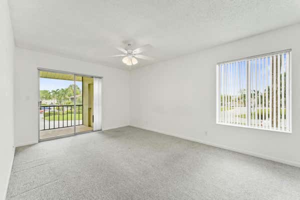 6543 CHASEWOOD DR APT E, JUPITER, FL 33458 - Image 1