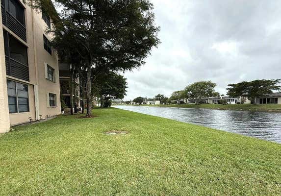 150 LAKE NANCY LN APT 124, WEST PALM BEACH, FL 33411 - Image 1