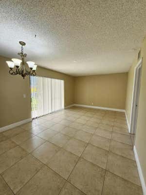 1680 WINDORAH WAY APT D, WEST PALM BEACH, FL 33411 - Image 1