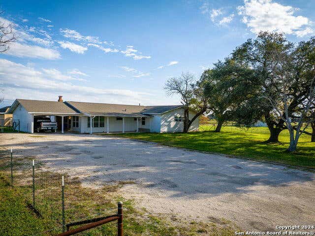 513 SOUTHERN WAY, LULING, TX 78648, photo 1 of 31