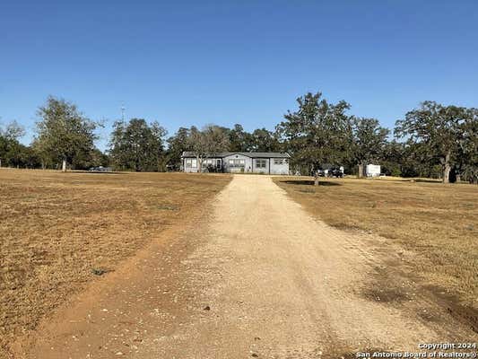 1434 COUNTY ROAD 425, STOCKDALE, TX 78160 - Image 1