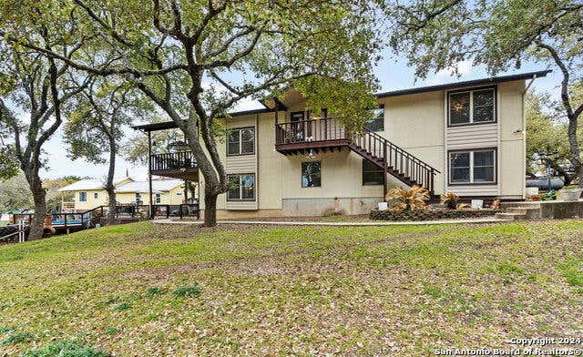 1497 PEBBLE BEACH RD, LAKEHILLS, TX 78063, photo 1 of 34