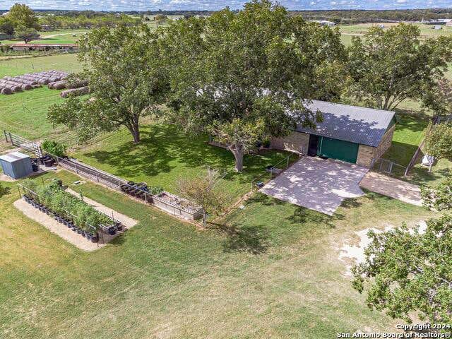 2034 COUNTY ROAD 342, LA VERNIA, TX 78121, photo 1 of 50