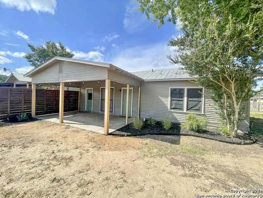 105 W DILLEY AVE, DEVINE, TX 78016 - Image 1