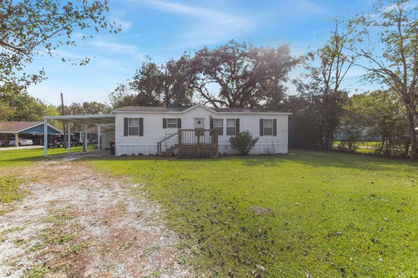 1140 OLD BEAUMONT RD, SOUR LAKE, TX 77659 - Image 1