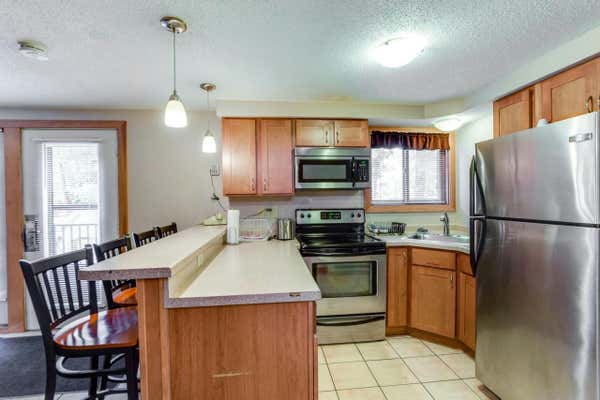 1093 CANYON RD # 102, WISCONSIN DELLS, WI 53965, photo 3 of 52