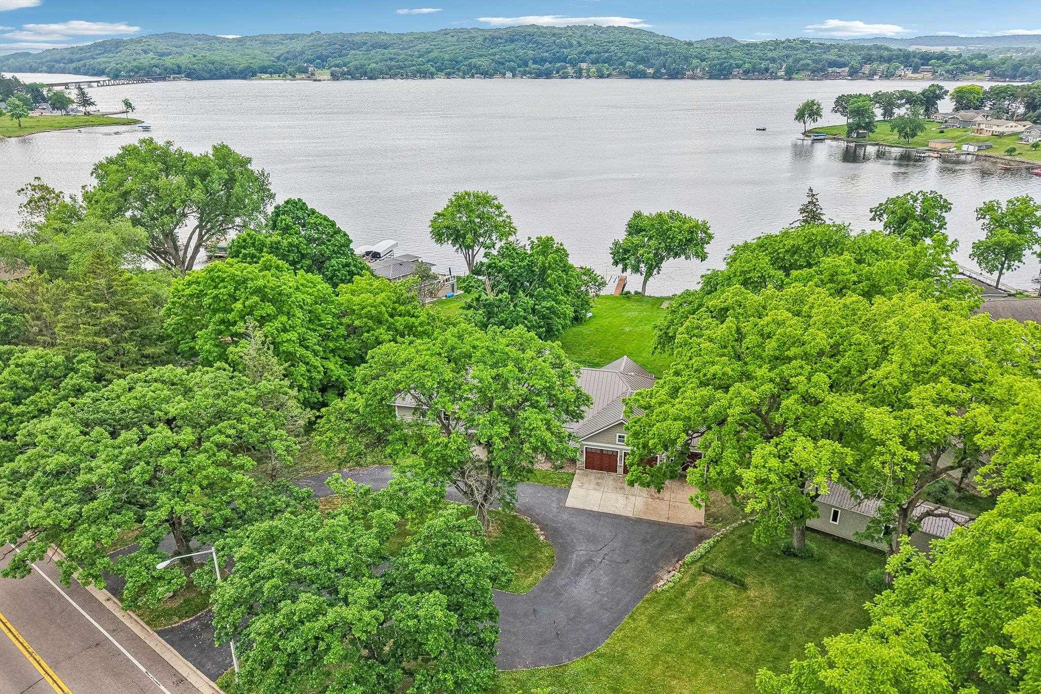 Showings begin Friday 6/12. Experience exceptional waterfront living i – image 59