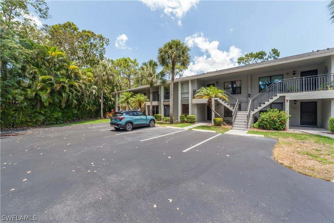 1227 COMMONWEALTH CIR # G103, NAPLES, FL 34116, photo 1 of 36