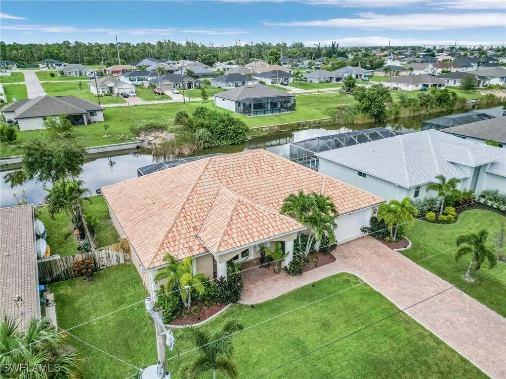 1121 SW 1ST TER, CAPE CORAL, FL 33991, photo 1 of 49