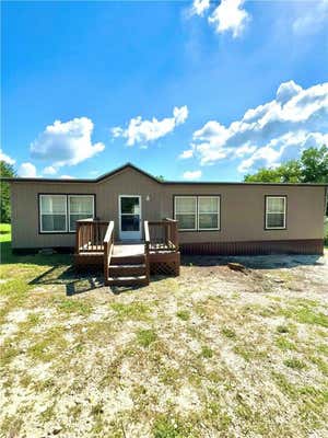 320 N JUDGE HAILEY DR, LOTT, TX 76656 - Image 1