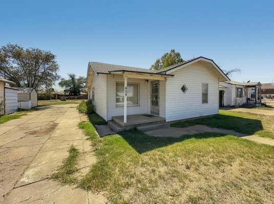 409 W BEDFORD ST, DIMMITT, TX 79027 - Image 1