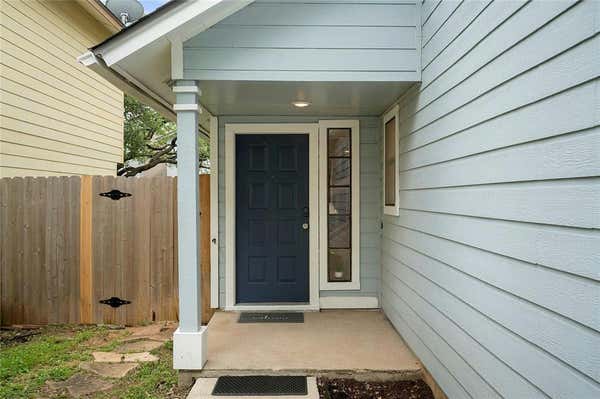 7705 GROVEDALE TRL, AUSTIN, TX 78729, photo 2 of 25