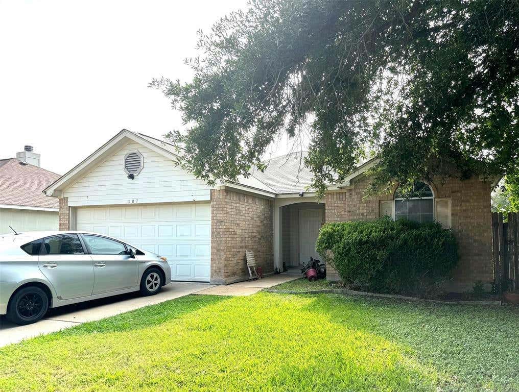 207 SUMMERSIDE AVE, LOCKHART, TX 78644, photo 1 of 18