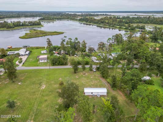 7815 LAKE SEMINOLE RD, SNEADS, FL 32460 - Image 1