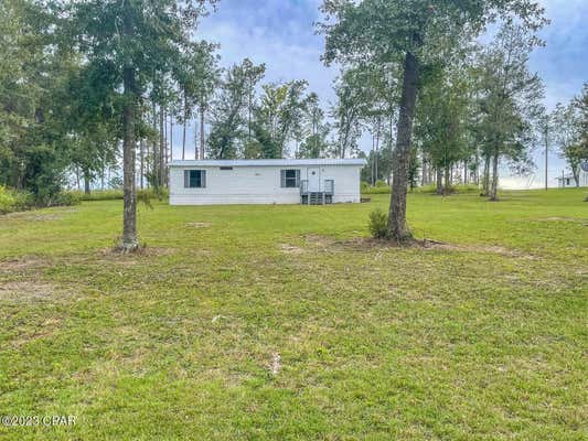 7815 LAKE SEMINOLE RD, SNEADS, FL 32460, photo 4 of 14