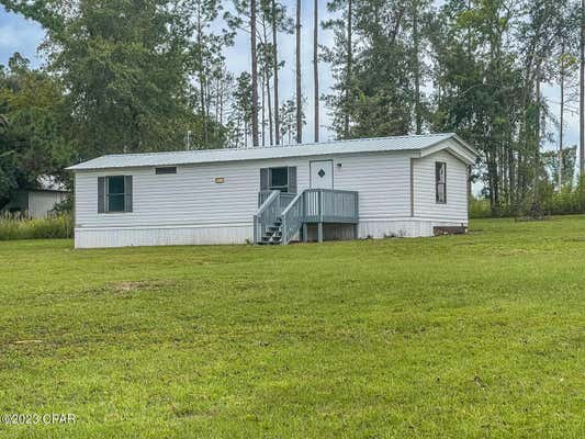 7815 LAKE SEMINOLE RD, SNEADS, FL 32460, photo 5 of 14