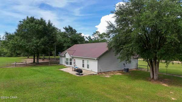 21260 NW OAK TREE RD, CLARKSVILLE, FL 32430, photo 2 of 54