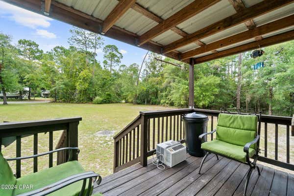 9507 S BURNT MILL CREEK RD, SOUTHPORT, FL 32409, photo 5 of 37