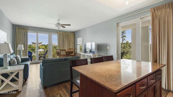 9860 S THOMAS DR UNIT 101, PANAMA CITY BEACH, FL 32408 - Image 1