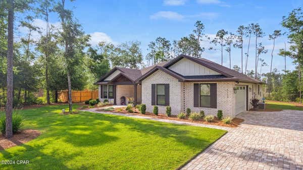 4123 CEDAR CREEK DR, SOUTHPORT, FL 32409, photo 4 of 56