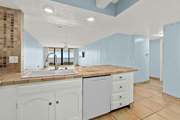 2815 S ATLANTIC AVE APT 205, COCOA BEACH, FL 32931, photo 4 of 32