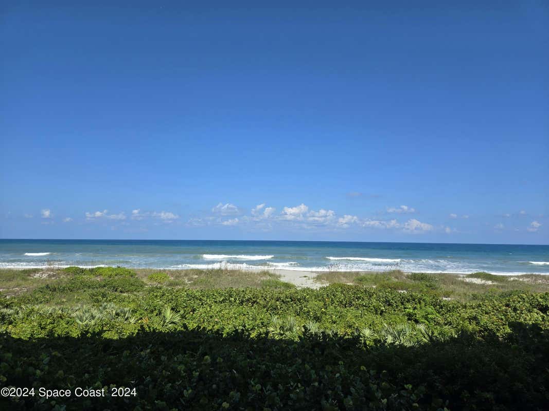 2815 S ATLANTIC AVE APT 205, COCOA BEACH, FL 32931, photo 1 of 32