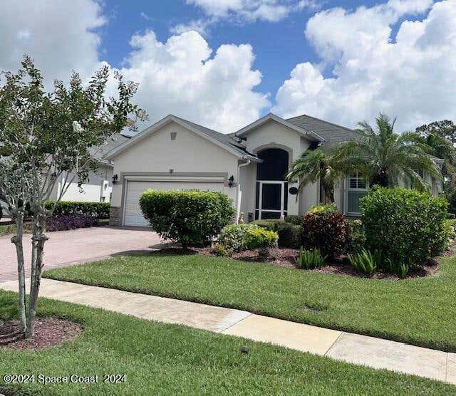 673 REMINGTON GREEN DR SE, PALM BAY, FL 32909, photo 1 of 24