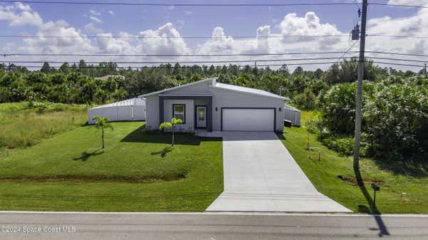 448 SAINT ANDRE BLVD SW, PALM BAY, FL 32908, photo 3 of 57