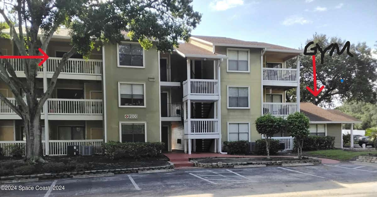 225 S TROPICAL TRL APT 221, MERRITT ISLAND, FL 32952, photo 1 of 30