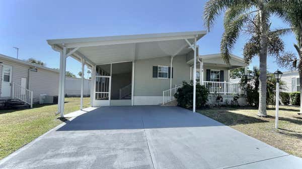 905 FRANGI PANI DR, BAREFOOT BAY, FL 32976 - Image 1