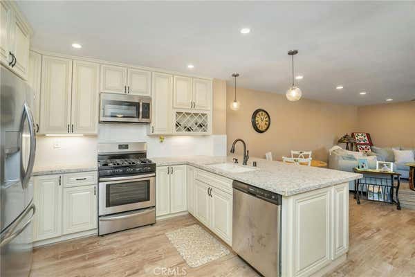 16866 KINGSBURY ST UNIT 304, GRANADA HILLS, CA 91344 - Image 1