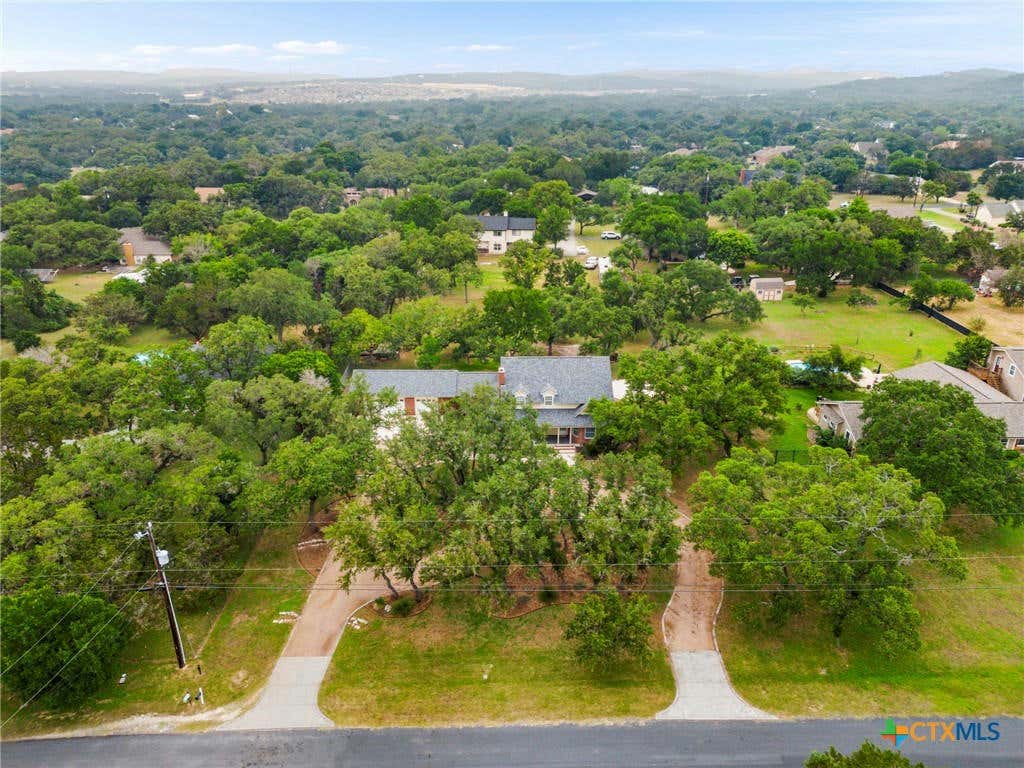 5231 HONEYSUCKLE BR, BULVERDE, TX 78163, photo 1 of 42