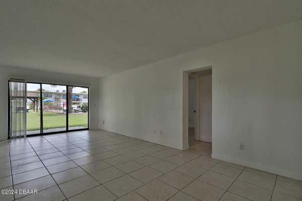 1504 VIRGINIA AVE APT 101, DAYTONA BEACH, FL 32114, photo 4 of 22