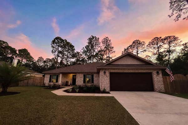 7133 LEISURE ST, NAVARRE, FL 32566, photo 1 of 9