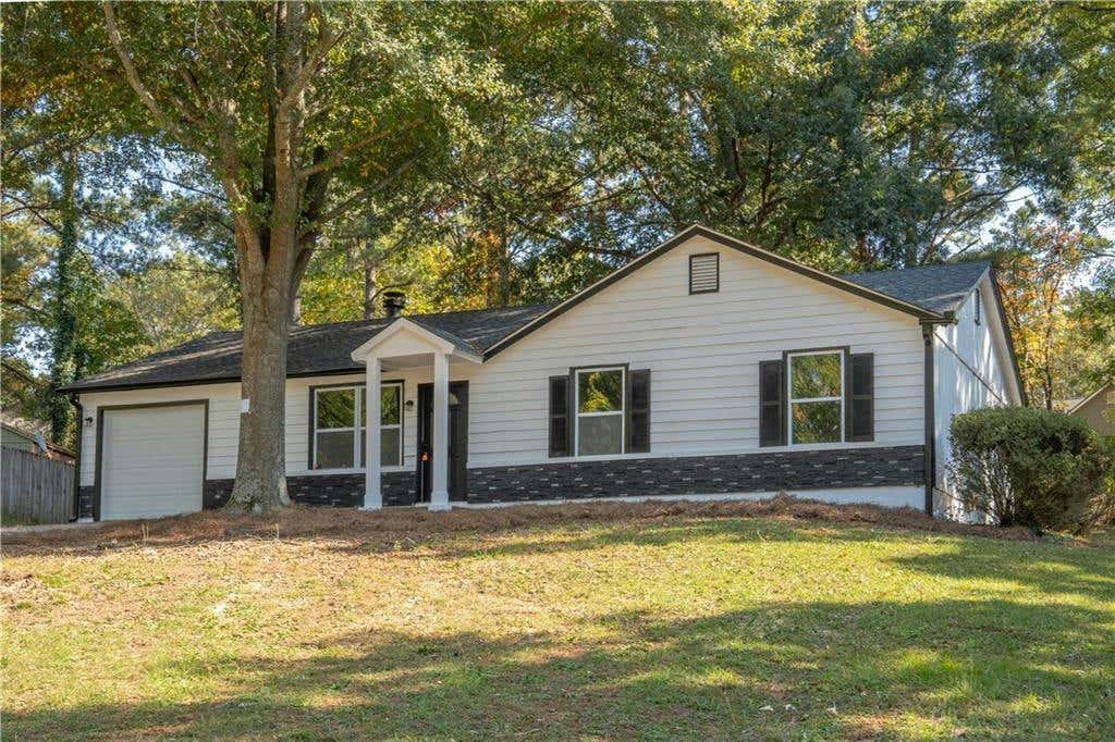 1053 FOREST EAST DR, STONE MOUNTAIN, GA 30088, photo 1 of 26