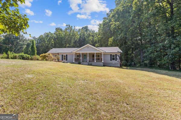 3571 S PUCKETT LN, BUFORD, GA 30519, photo 4 of 45