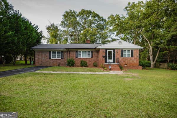 104 TYUS ST, BARNESVILLE, GA 30204 - Image 1