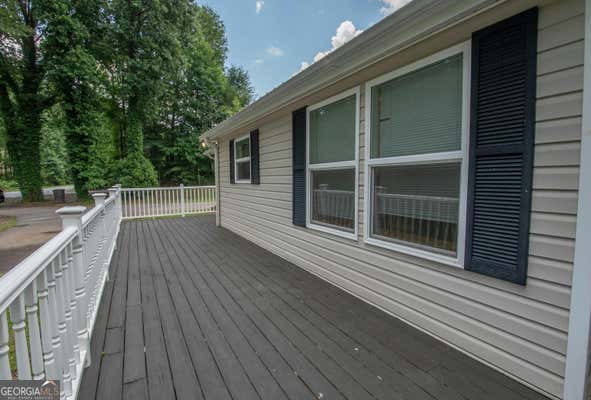 711 WILLIAMSON ZEBULON RD, WILLIAMSON, GA 30292, photo 4 of 55