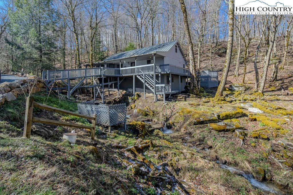 126 STAGHORN HOLLOW RD, BEECH MOUNTAIN, NC 28604, photo 1 of 50