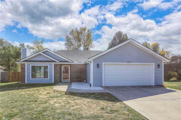 1013 ROCK CREEK LN, GRAIN VALLEY, MO 64029 - Image 1