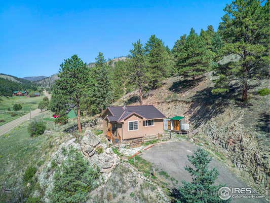 1368 DUNRAVEN GLADE RD, GLEN HAVEN, CO 80532 - Image 1