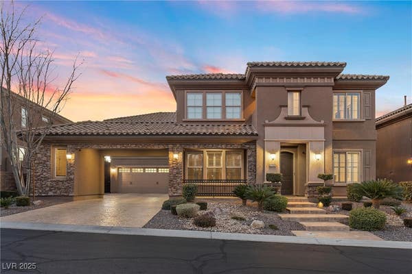 Elegant two-story home in Madeira Canyon with mountain backdrop
