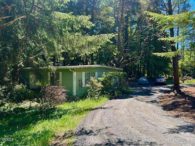 805 NW DOWNING LN, SEAL ROCK, OR 97376, photo 1 of 28